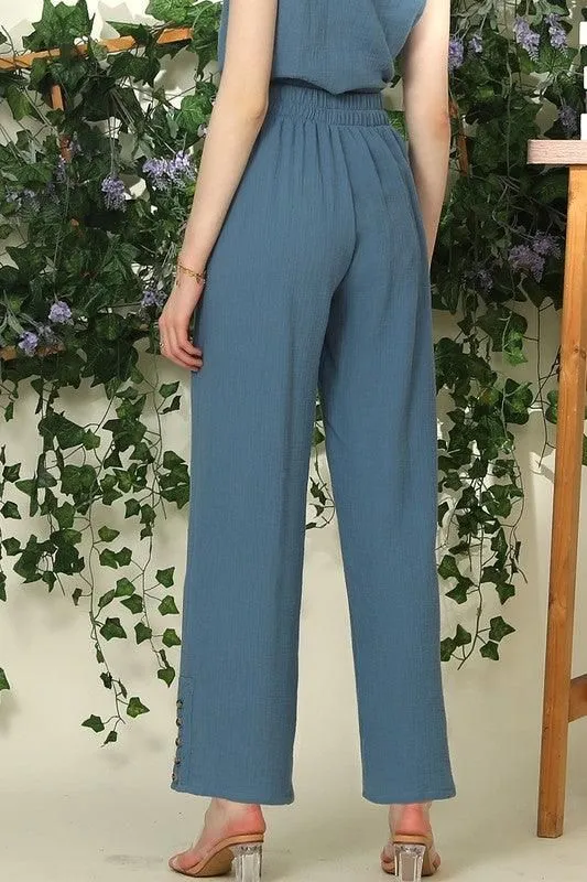 BANDED SMOCKING LONG PANTS WITH BUTTON DETAILED