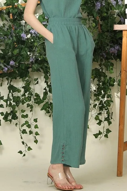 BANDED SMOCKING LONG PANTS WITH BUTTON DETAILED