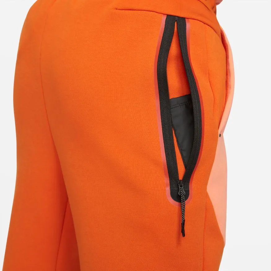 Nike Sportswear Tech Fleece in Campfire Orange, Orange Frost, and Black